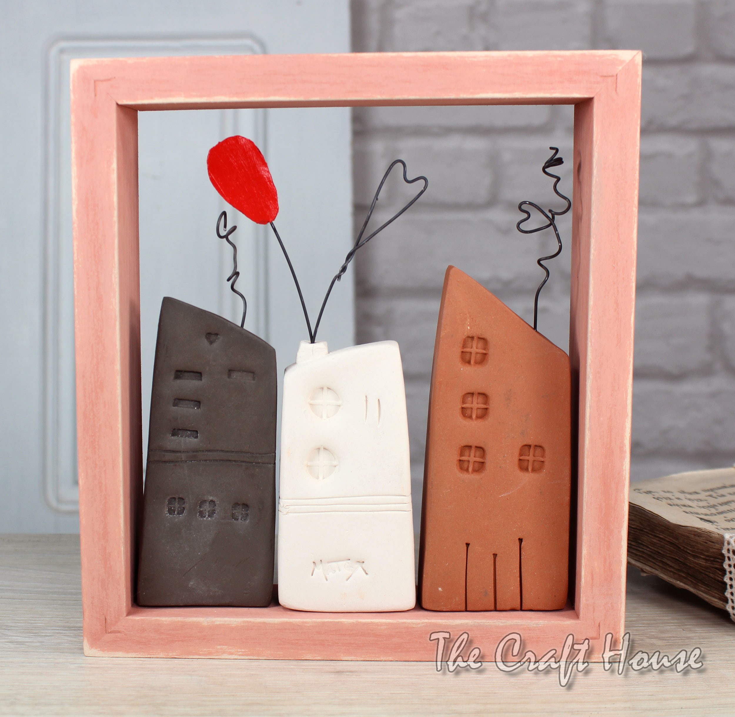 Ceramic houses - 50 € ( 97.79 lv)