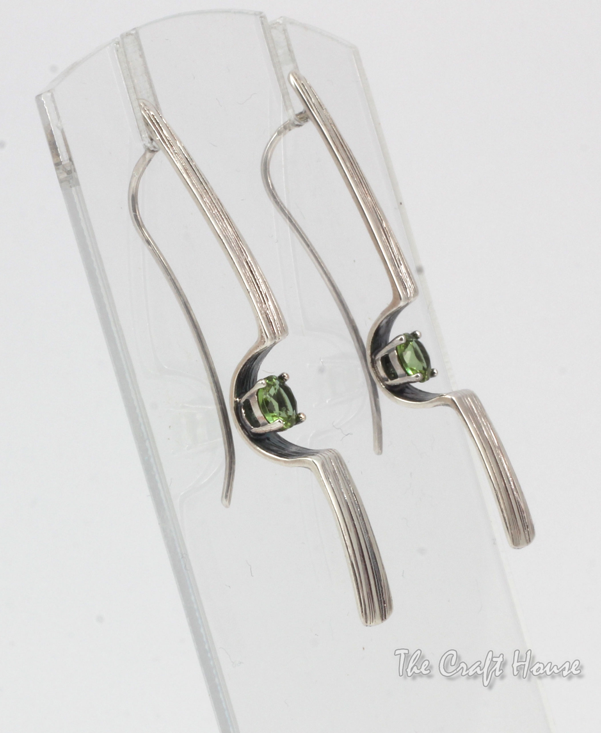 Silver earrings with Zultanite