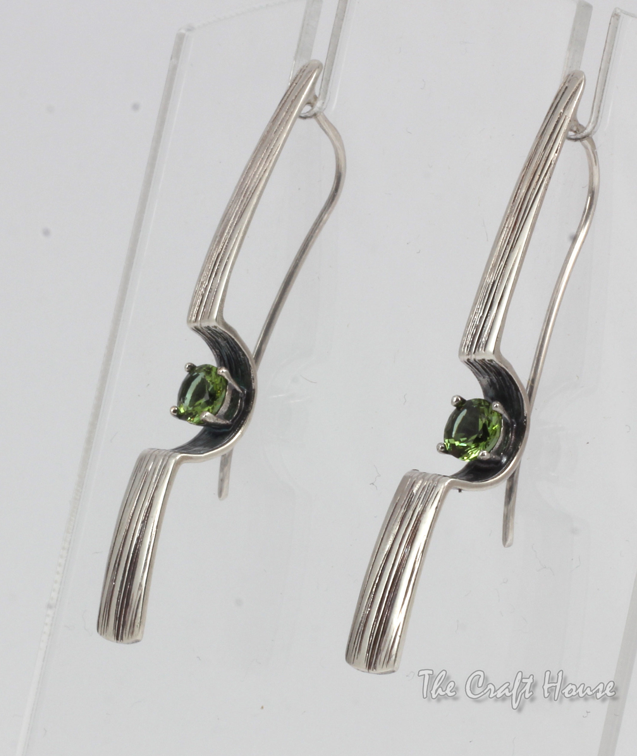 Silver earrings with Zultanite
