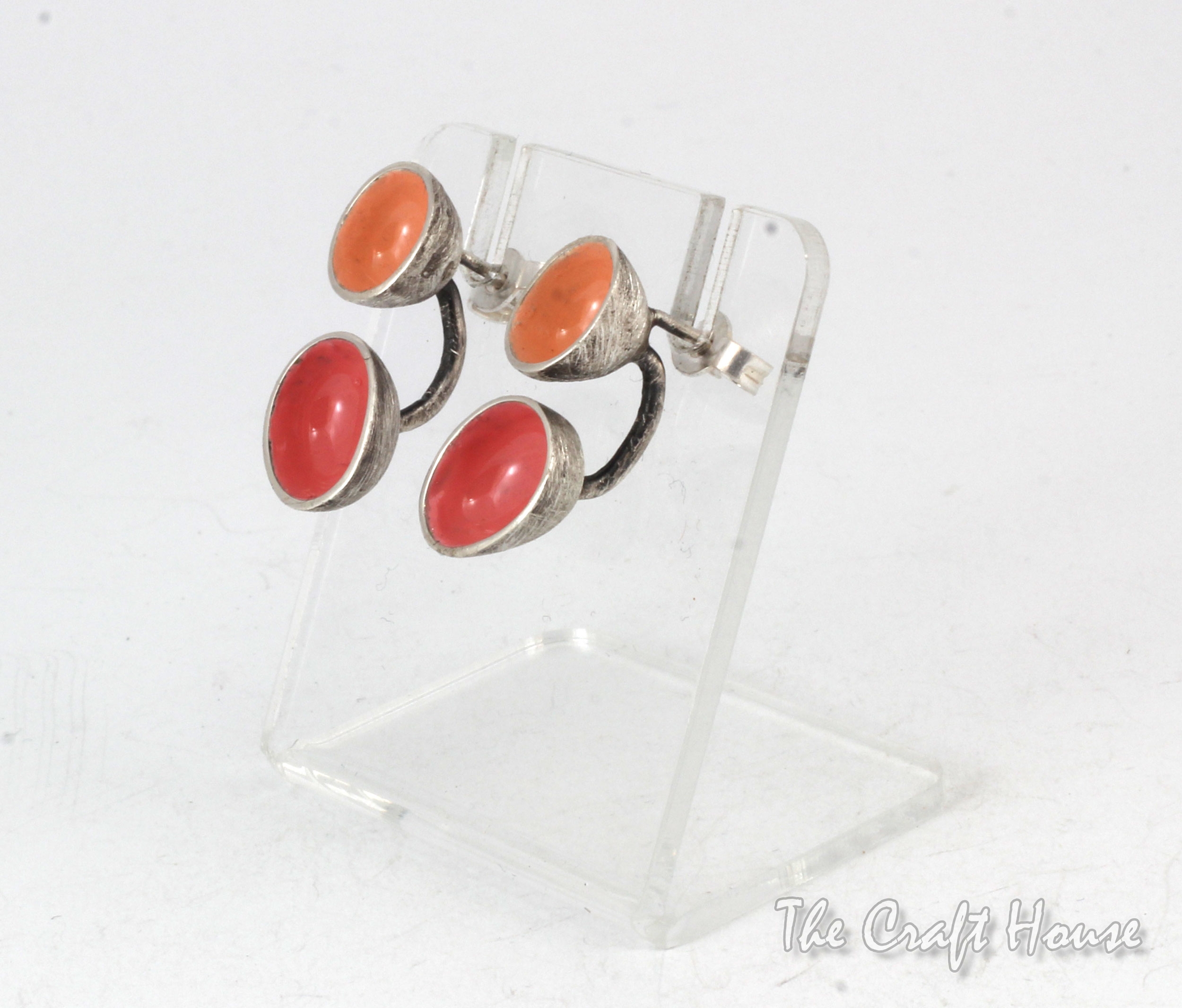 Silver earrings with pink enamel