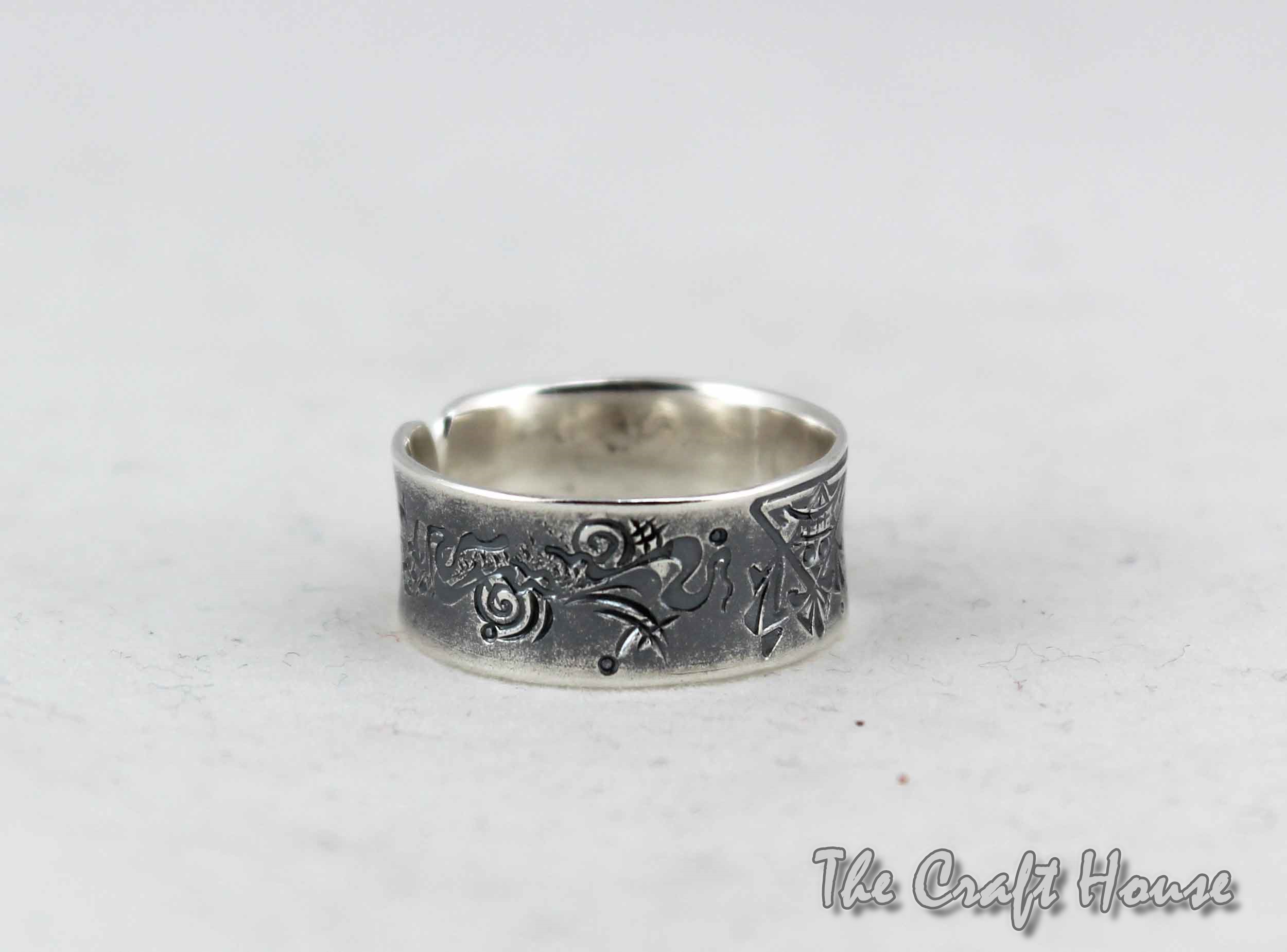 Silver ring with engraving