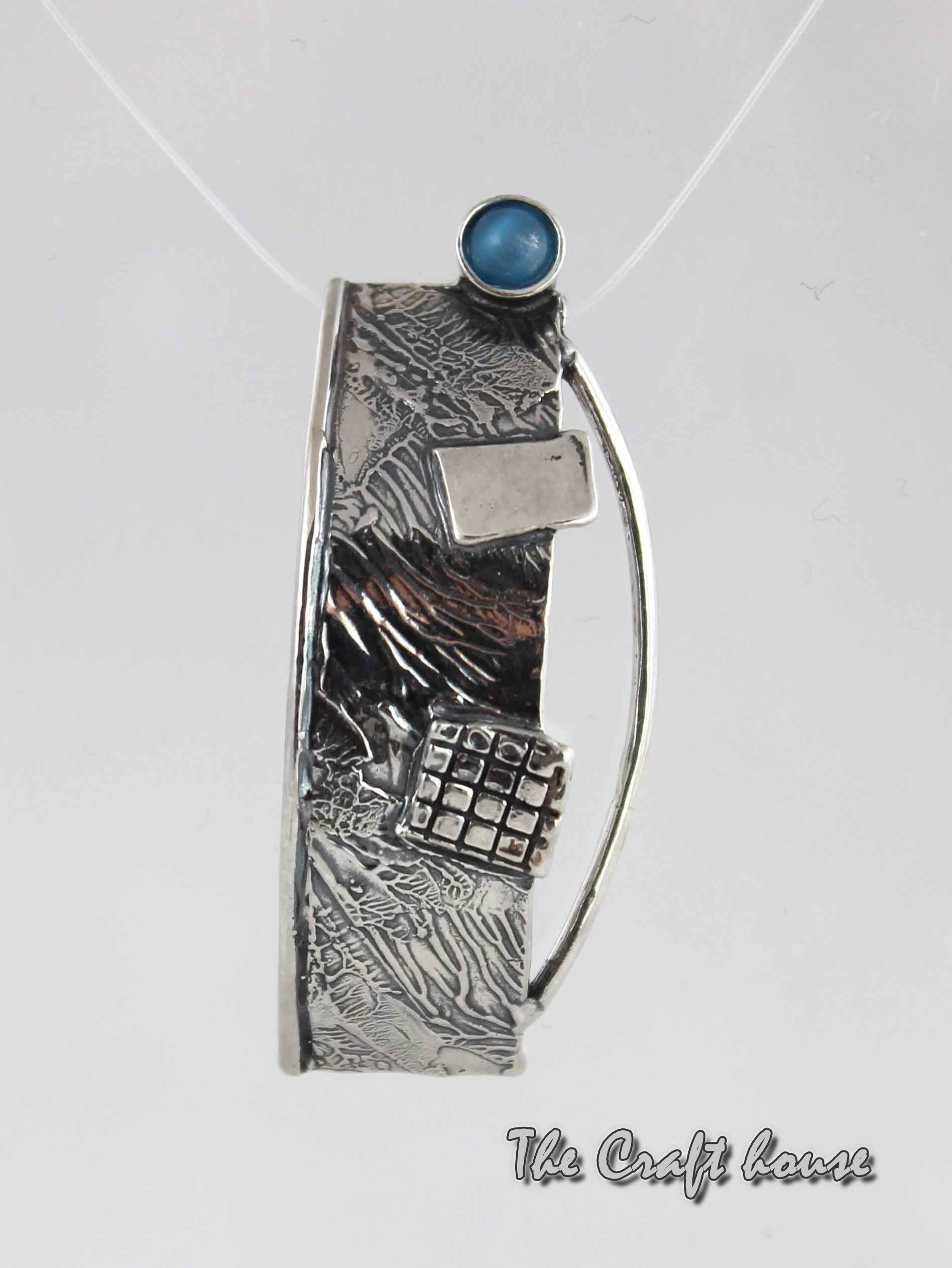 Silver pendant with Cat's eye stone