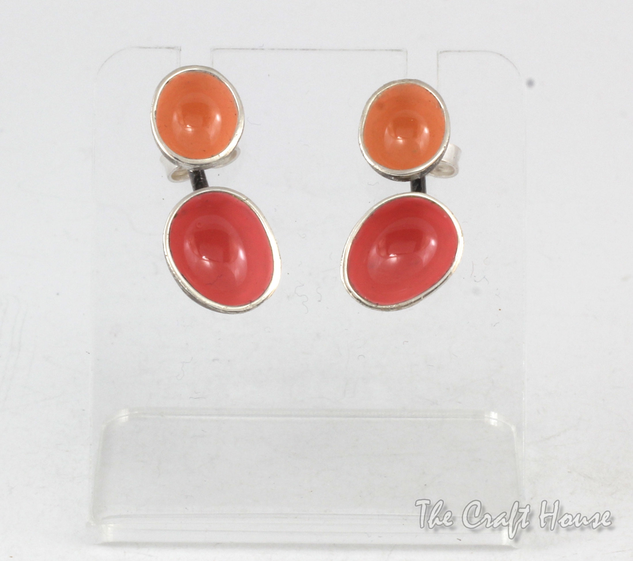 Silver earrings with pink enamel