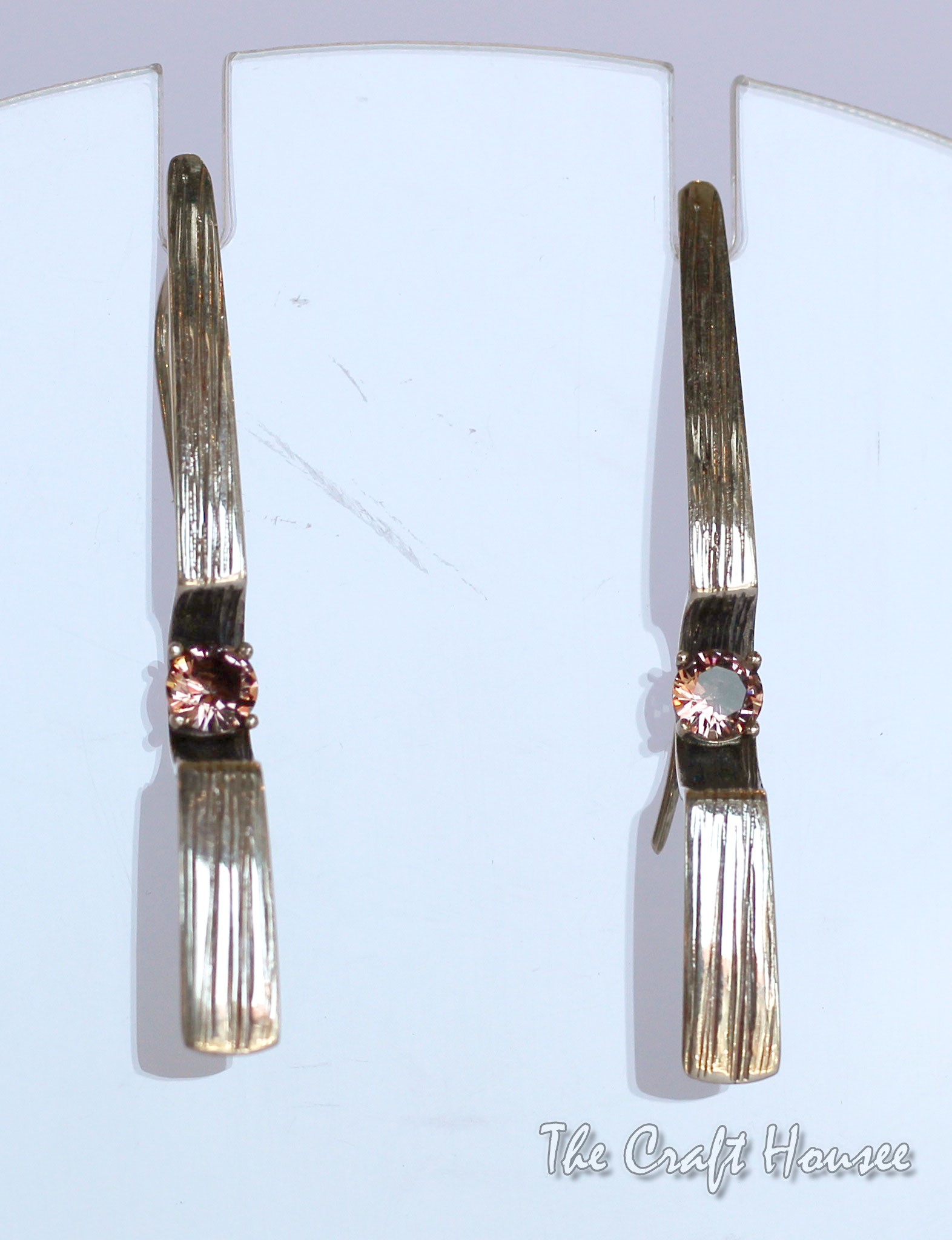 Silver earrings with Zultanite