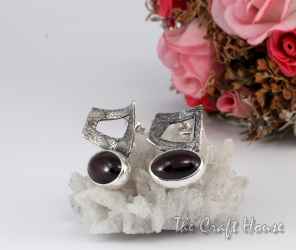 Silver earrings with Ruby - € ( lv)